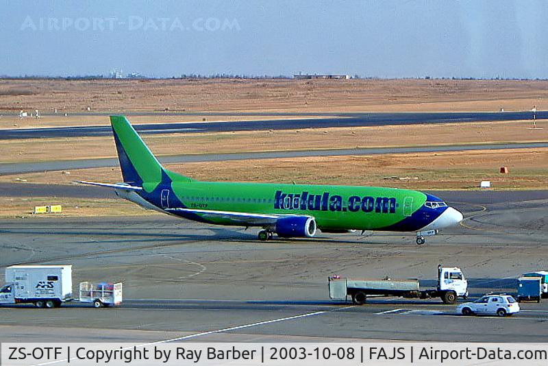 ZS-OTF, 1991 Boeing 737-436 C/N 25305, Boeing 737-436 [25305] (Kulula Airlines) Johannesburg-Int'l~ZS 08/10/2003 Not the best of images.