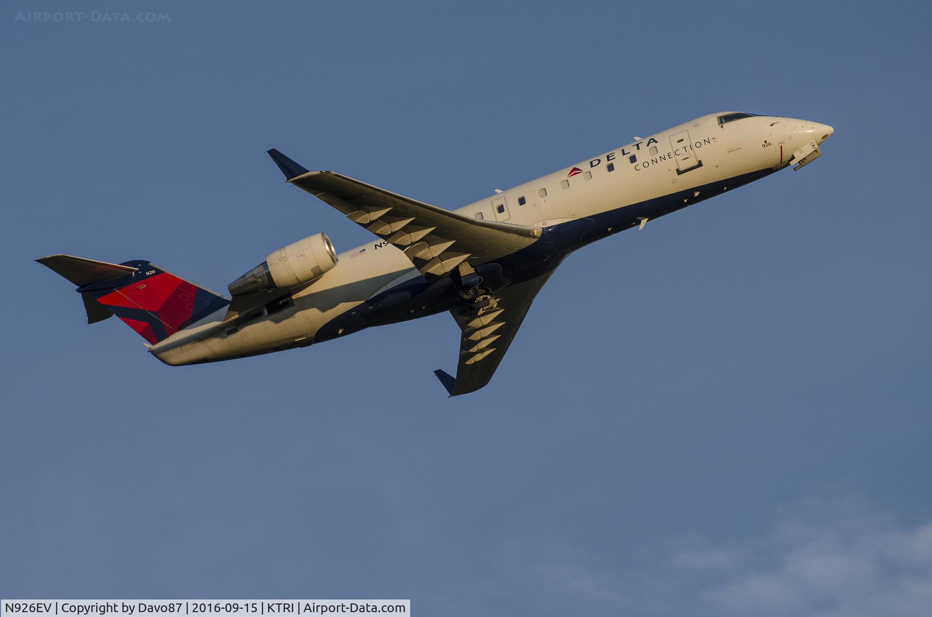 N926EV, 2003 Bombardier CRJ-200ER (CL-600-2B19) C/N 7843, Departing Tri-Cities Airport (KTRI) in the late afternoon sun.