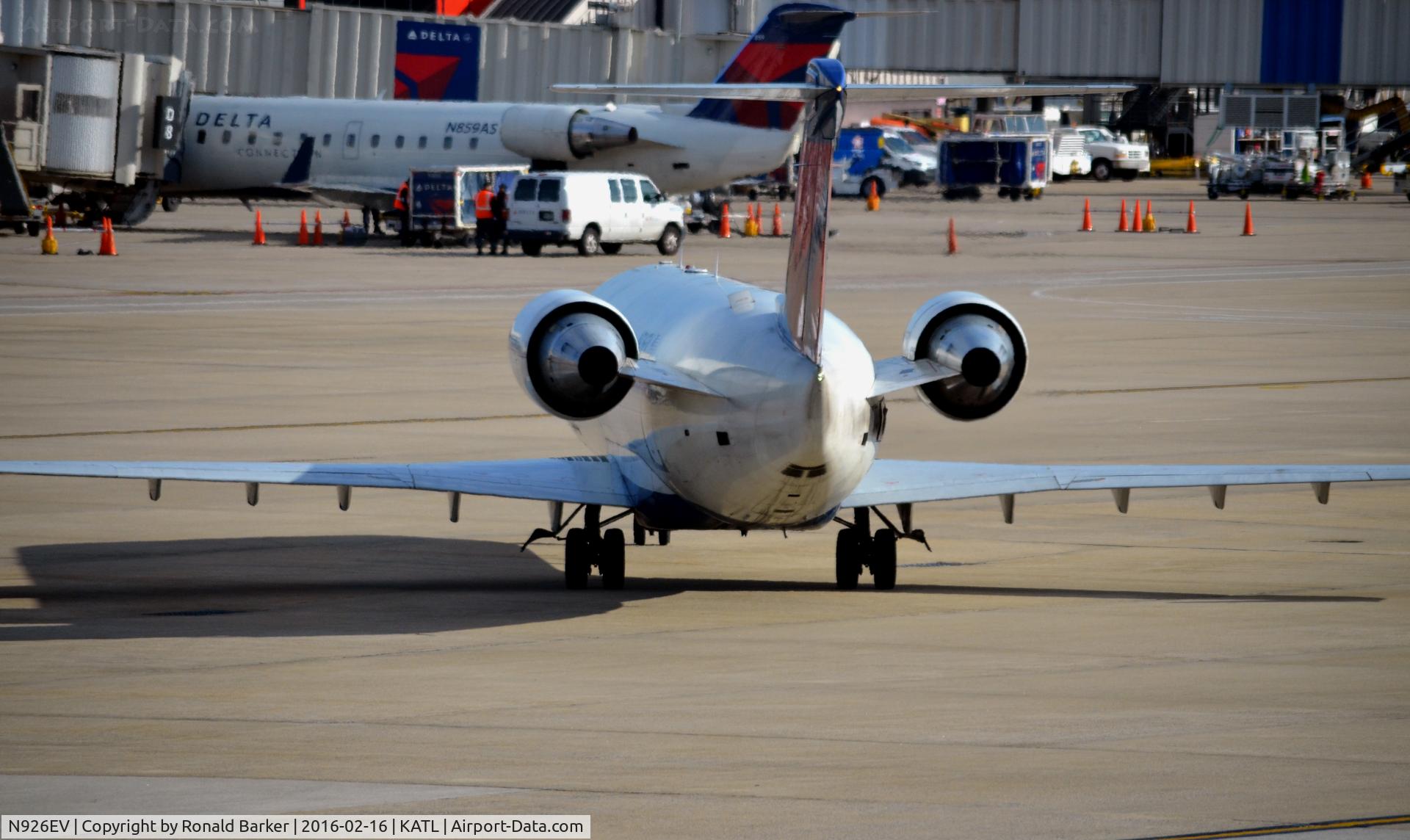 N926EV, 2003 Bombardier CRJ-200ER (CL-600-2B19) C/N 7843, Tail on and taxing Atlanta