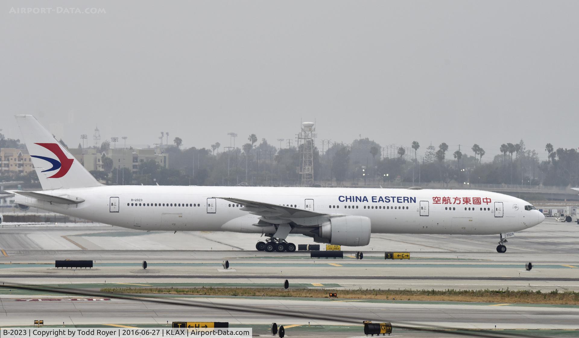 B-2023, 2015 Boeing 777-39P/ER C/N 43275, Taxiing to gate at LAX