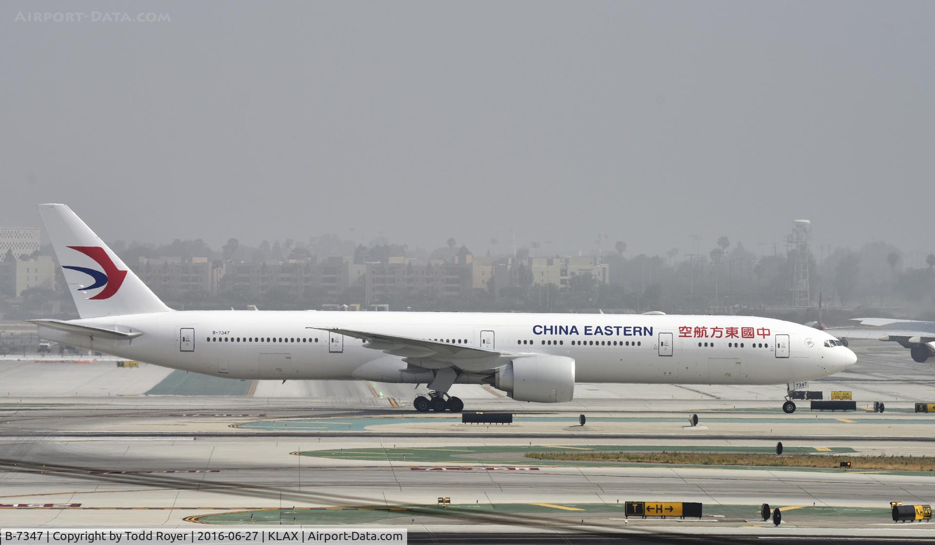 B-7347, 2016 Boeing 777-39P/ER C/N 43278, Taxiing for departure at LAX