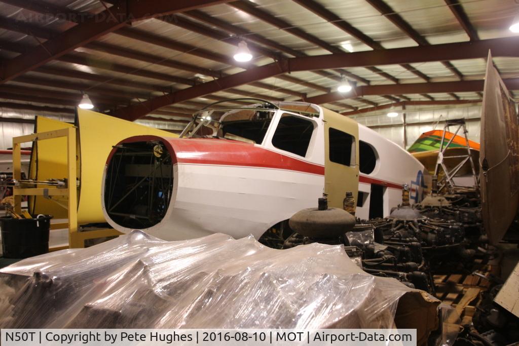 N50T, 1943 Cessna UC-78B (T-50) Bobcat Bobcat C/N 6548, N50T Bobcat under restoration in the workshop of the superb Dakota Territory Air Museum at Minot, North Dakota