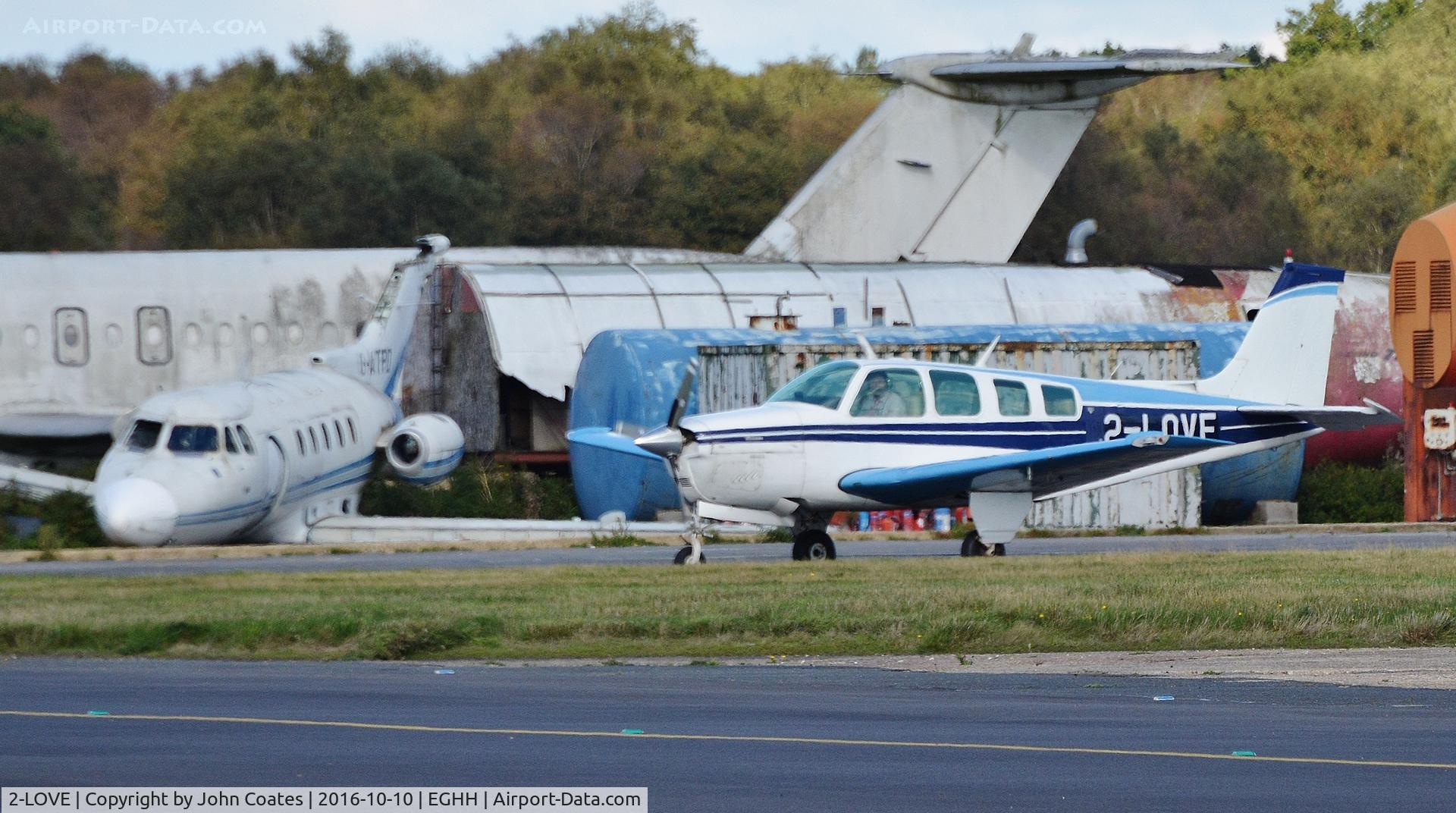 2-LOVE, 1976 Beech A36 Bonanza 36 Bonanza 36 C/N E-854, Taxiing past the fire dump