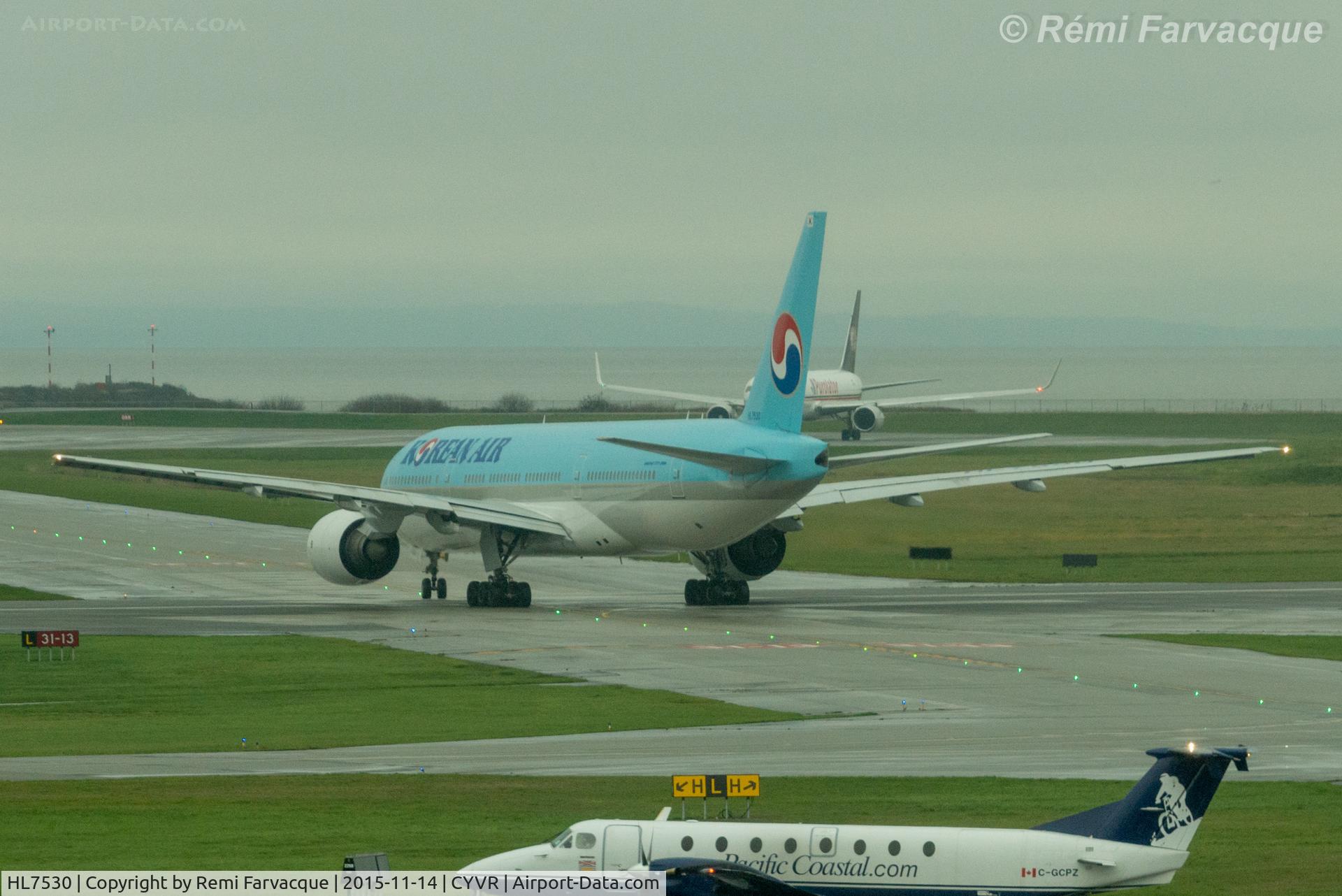 HL7530, 1997 Boeing 777-2B5/ER C/N 27945, Taxiing for take-off to south runway with easterly departure.