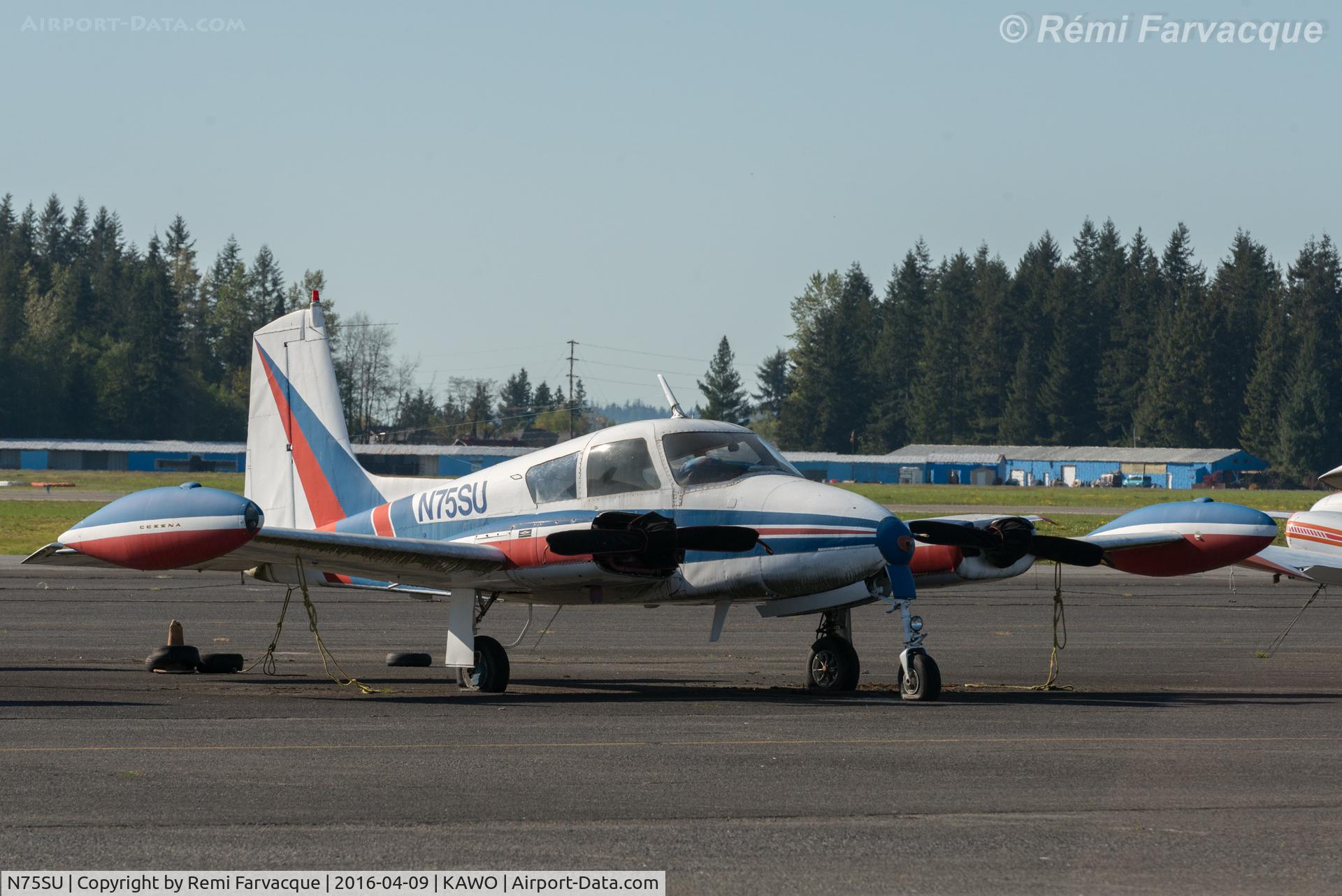 N75SU, 1958 Cessna U-3A Blue Canoe (310A) C/N 38110, PArked south of main terminal.