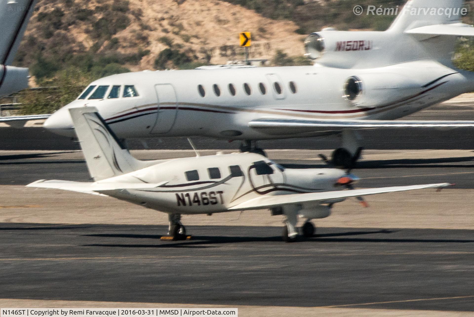 N146ST, 2004 Piper PA-46-350P Malibu Mirage C/N 4636354, Parked in executive jet area.