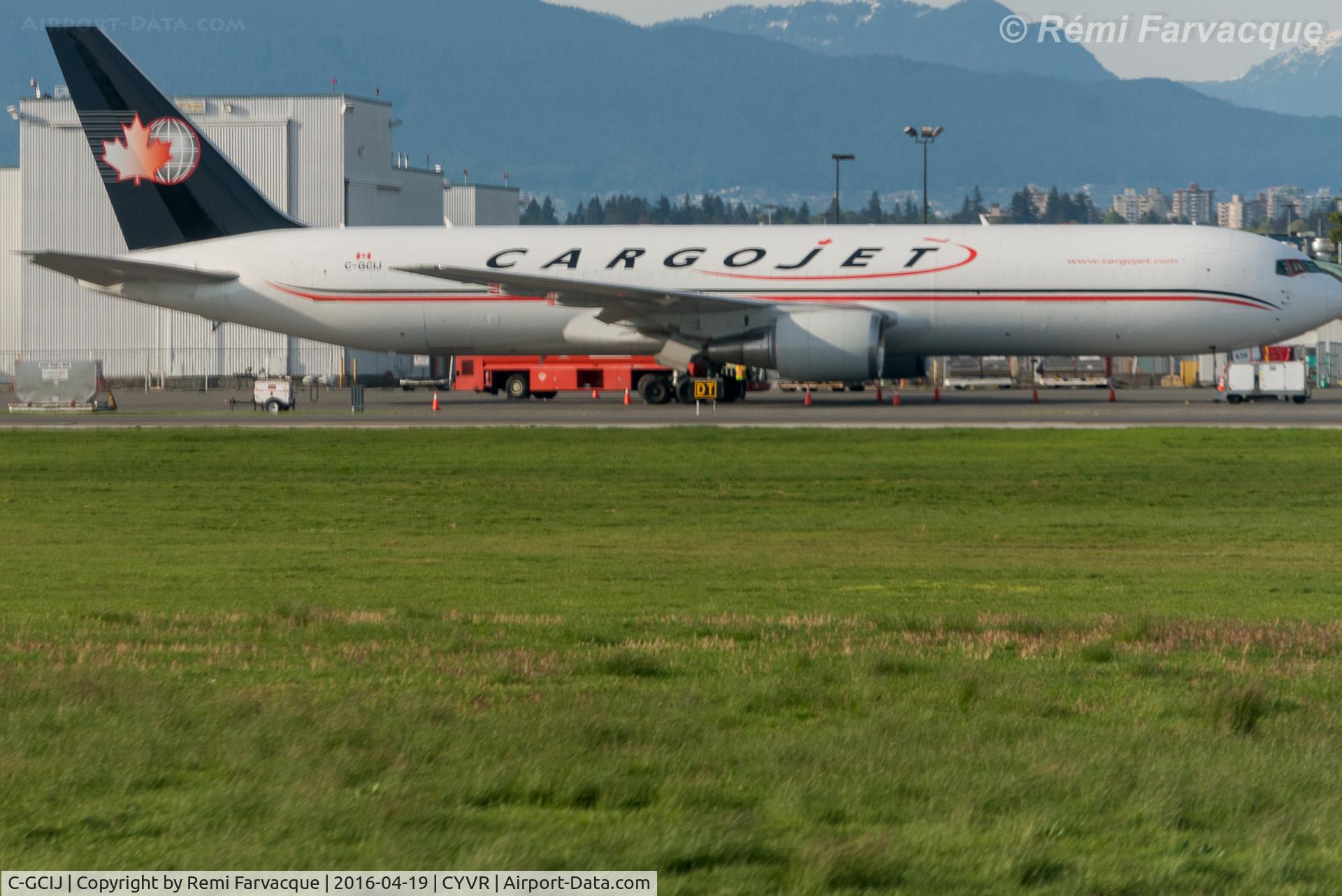 C-GCIJ, 1995 Boeing 767-306/ER C/N 26263, Parked in front of hangar.