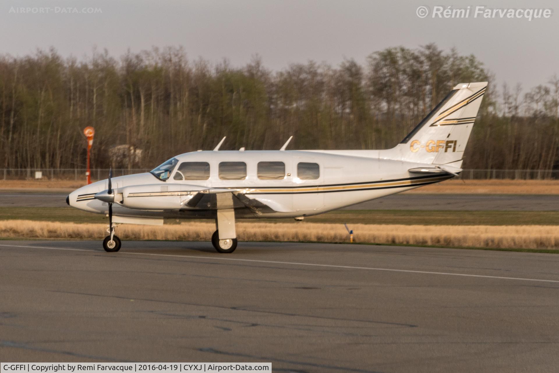 C-GFFI, 1976 Piper PA-31 C/N 31-7612027, Parked opposite main terminal.