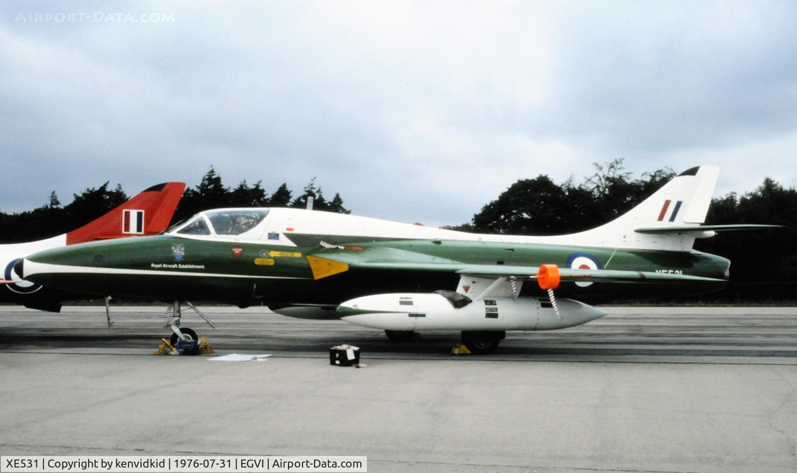 XE531, 1956 Hawker Hunter T.12 C/N 41H/679906, At the 1976 International Air Tattoo Greenham Common, copied from slide.
This aircraft spent it's whole time at the R.A.E. it was fitted with a F-16 side stick controller and the two probes on the wings were linked directly to the auto-pilot. W/O 17/03/8