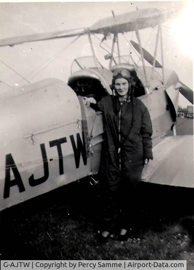 G-AJTW, 1939 De Havilland DH-82A Tiger Moth II C/N 82203, I believe my uncle, Percy H G Samme, might have owned this aircraft back in 1947. The picture is of my mother standing beside it in her flying gear.