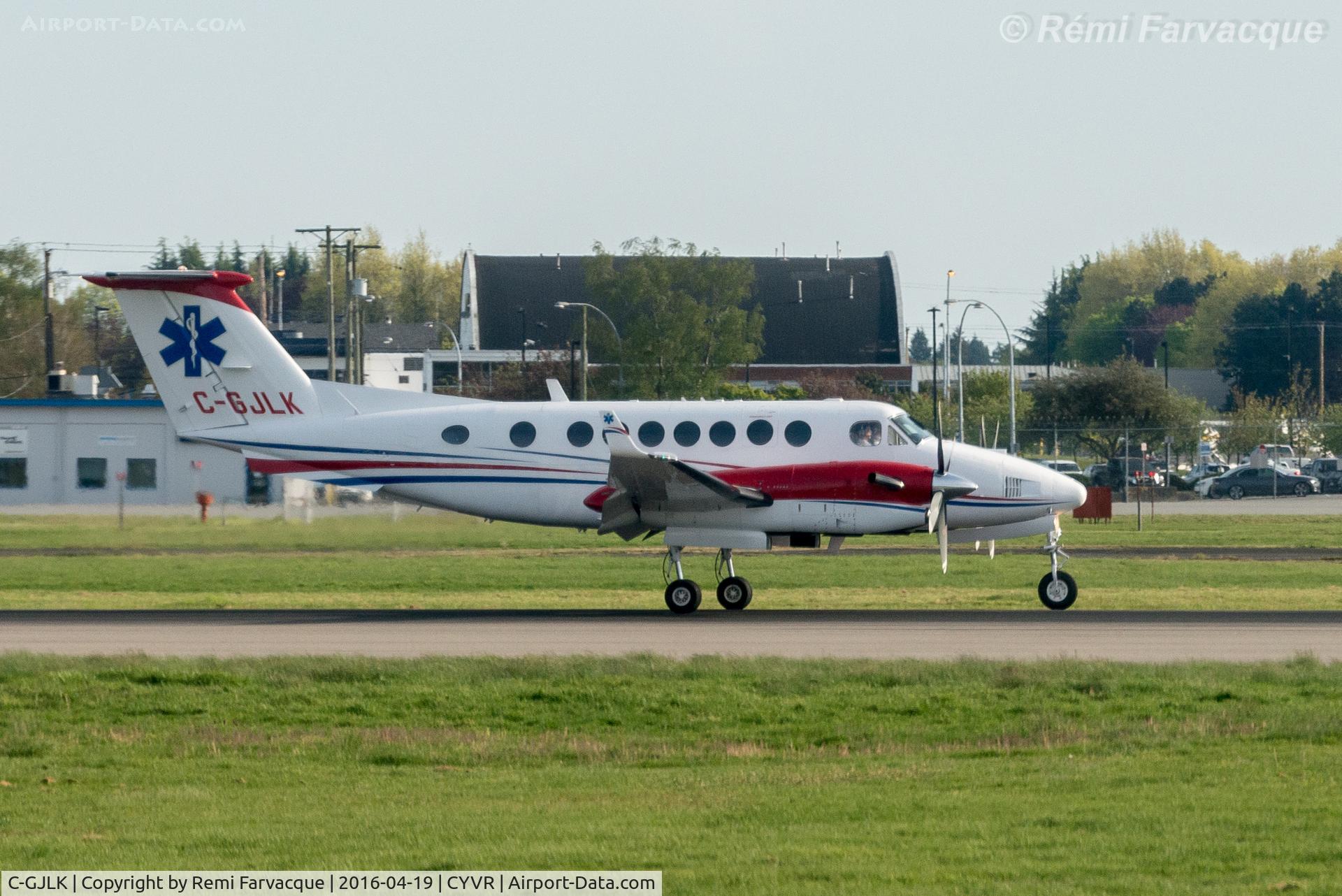 C-GJLK, 1990 Beech B300 King Air C/N FL13, Taxiing off south runway after landing.