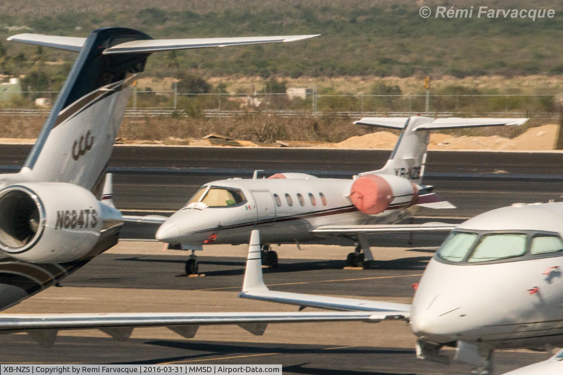 XB-NZS, 2000 Learjet 31A C/N 31-208, Parked in executive jet area.