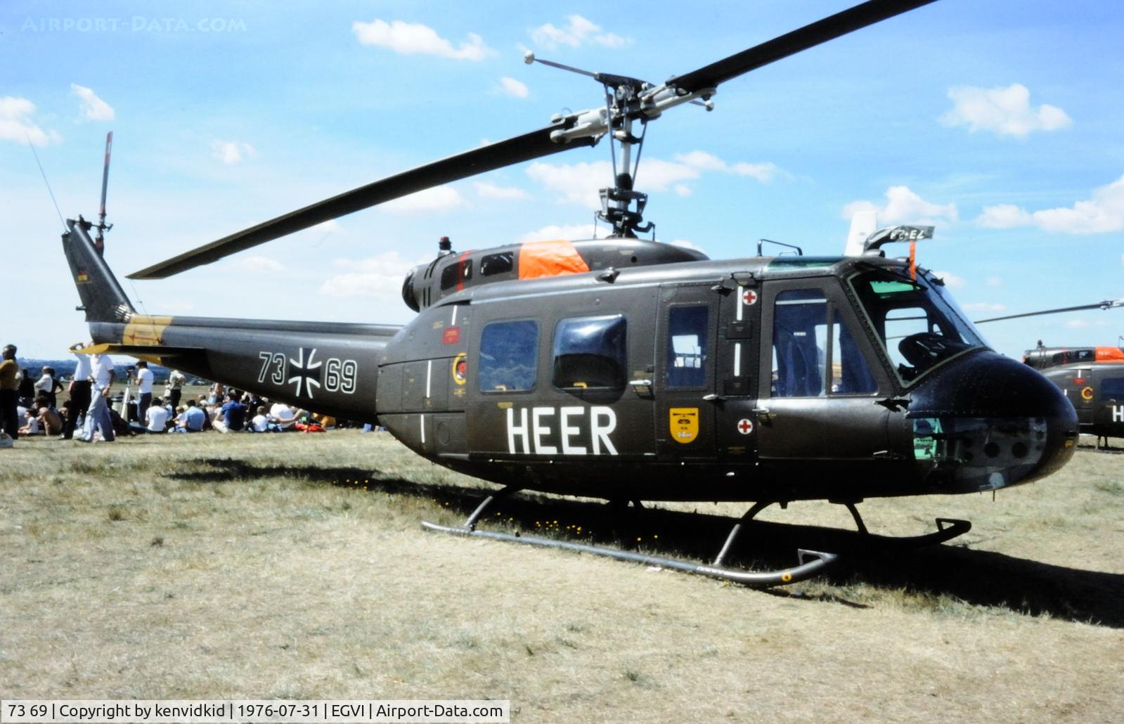73 69, Bell (Dornier) UH-1D Iroquois (205) C/N 8489, At the 1976 International Air Tattoo Greenham Common, copied from slide.