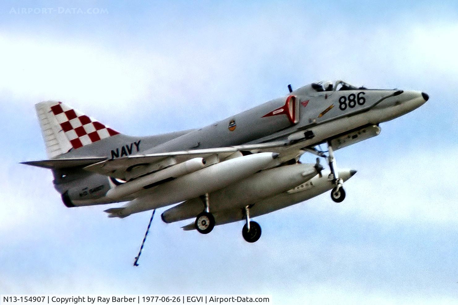 N13-154907, Douglas A-4G Skyhawk C/N 13780, Douglas A-4G Skyhawk [13780] (Royal Australian Navy) RAF Greenham Common~G 26/06/1977. From a slide .Shown with arrester hook down.