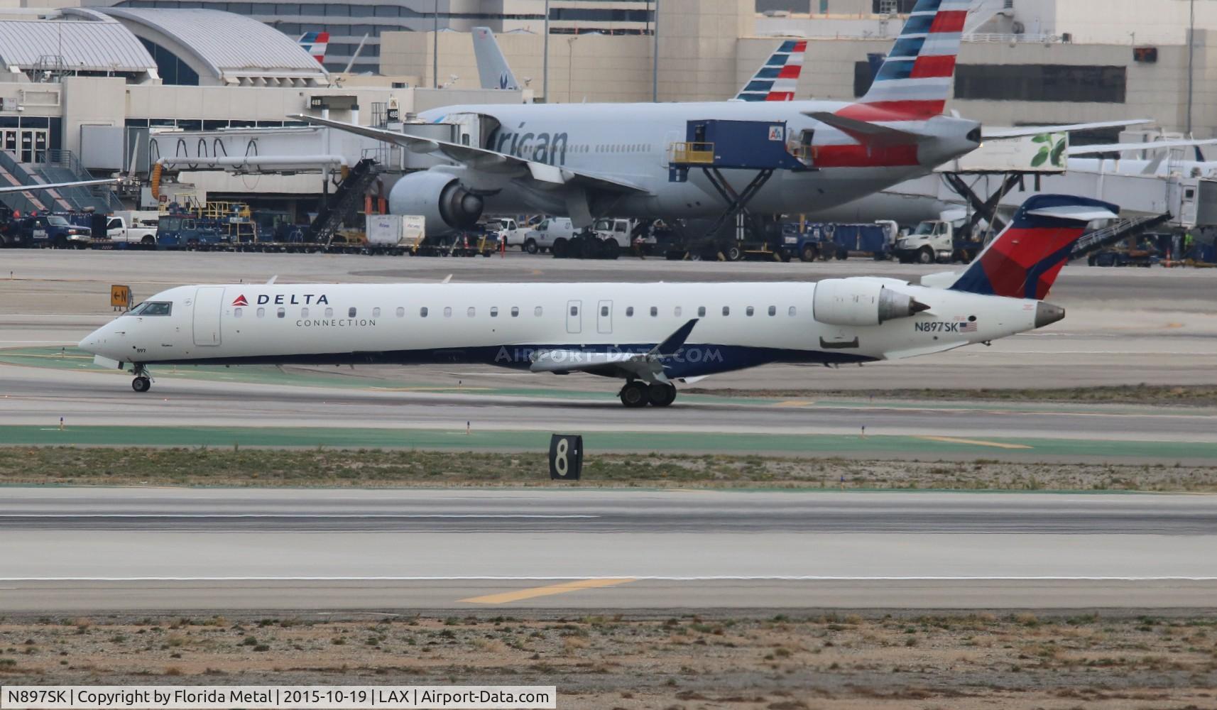 N897SK, 2006 Canadair CRJ-900LR (CL-600-2D24) C/N 15103, Delta Connection