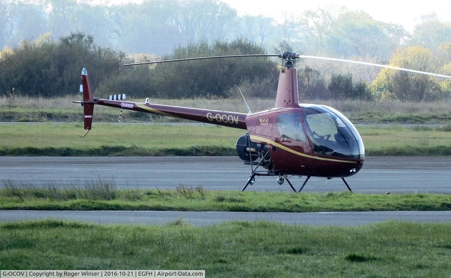 G-OCOV, 2001 Robinson R22 Beta C/N 3217, Resident R22 Beta II operated by HeliAir Wales.