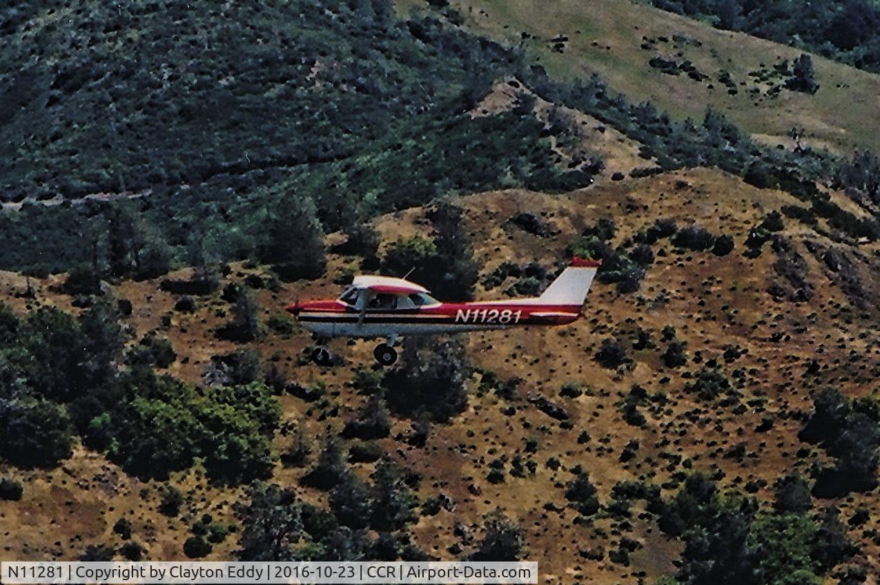 N11281, 1973 Cessna 150L C/N 15075295, Flying by Mt. Diablo California.