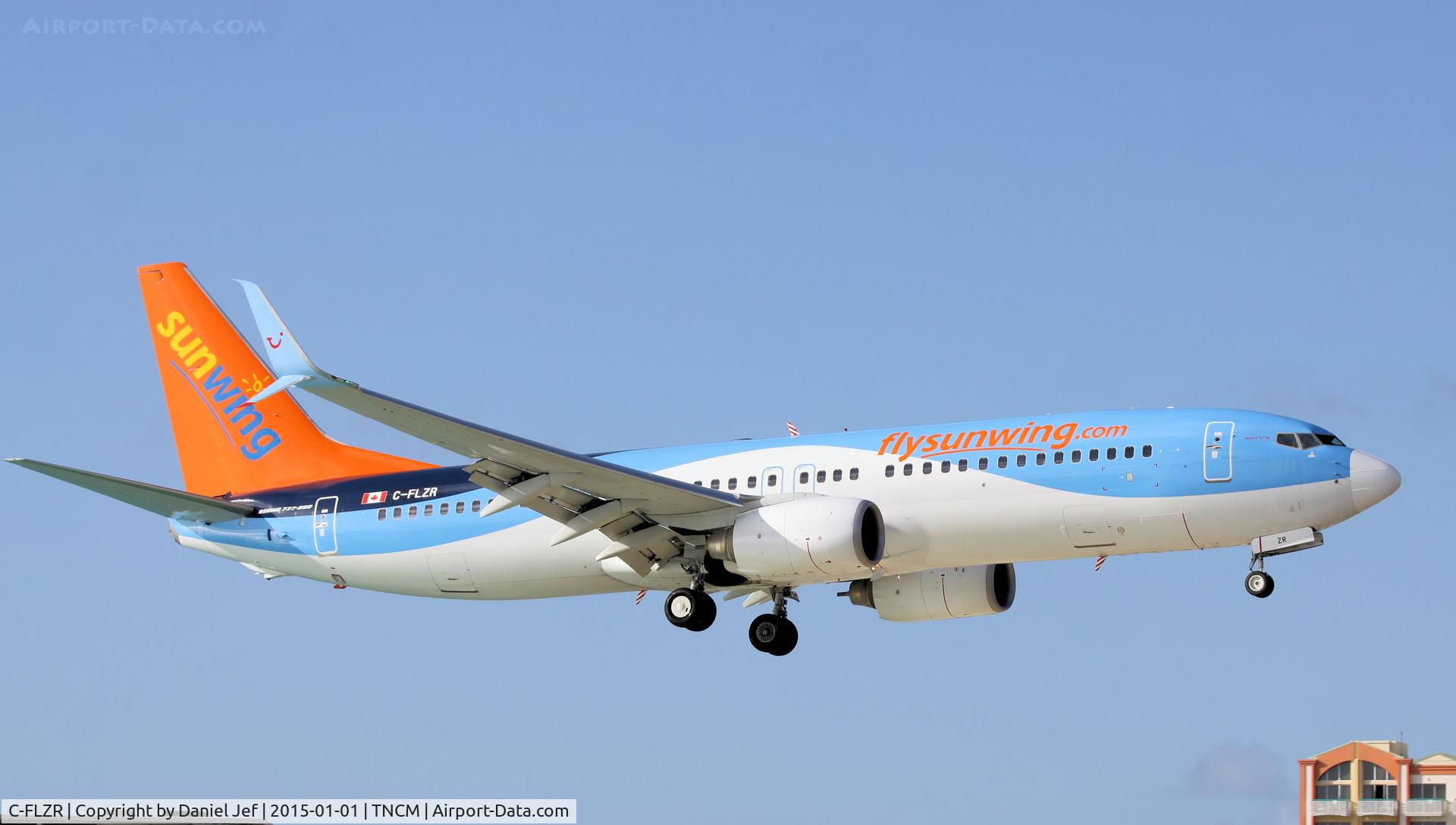C-FLZR, 2009 Boeing 737-8K5 C/N 35145, Sunwing landing at TNCM