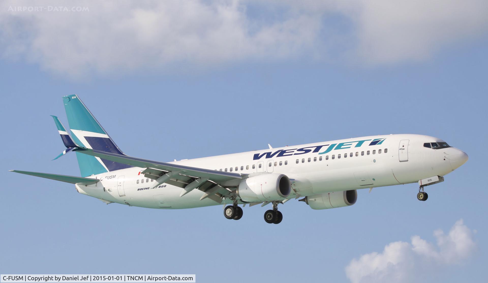 C-FUSM, 2013 Boeing 737-8CT C/N 39081, Westjet landing at TNCM