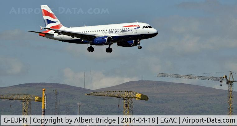 G-EUPN, 2000 Airbus A319-131 C/N 1261, On final approach.  Belfast harbour cranes in the background.