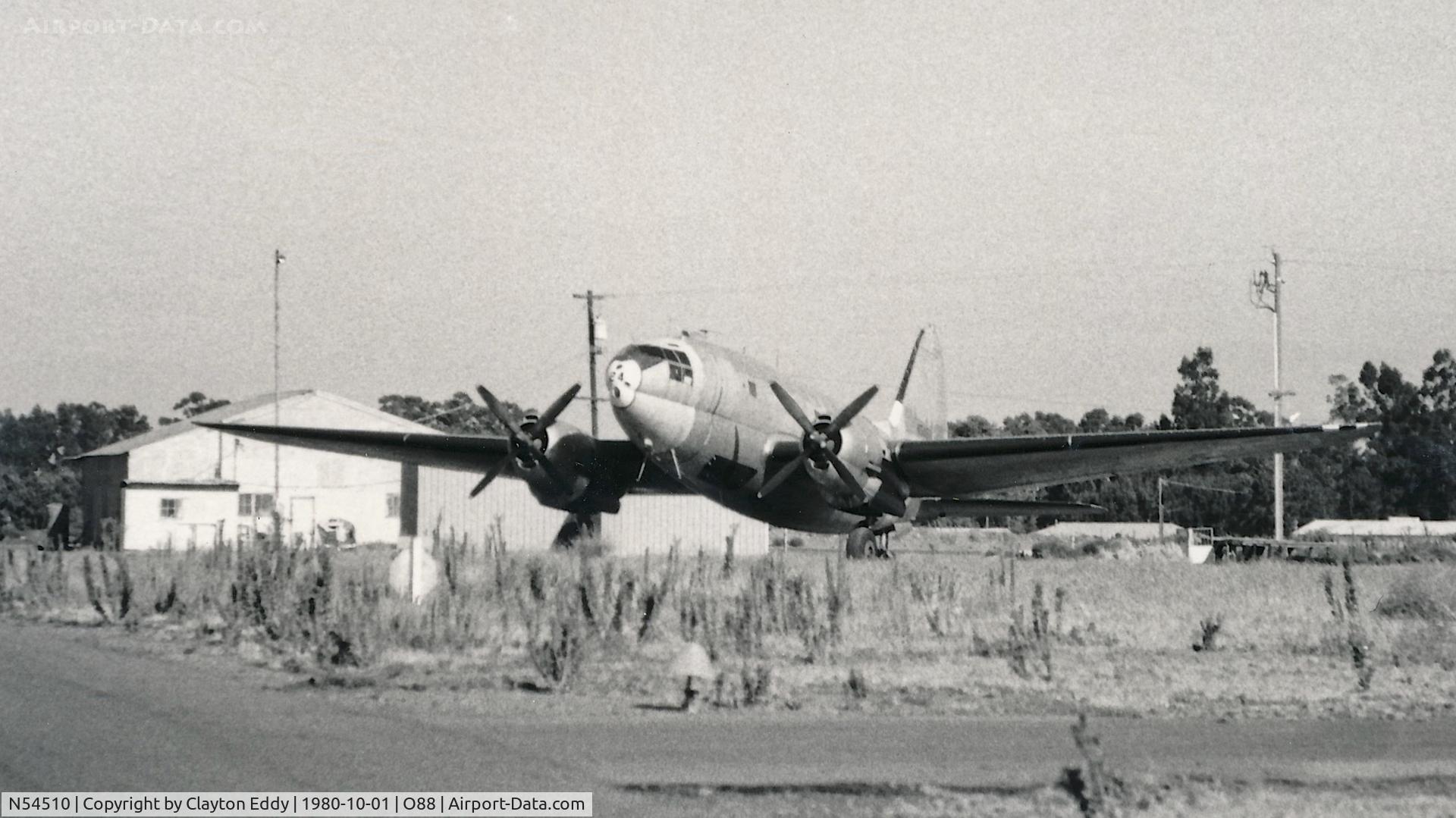 N54510, 1944 Curtiss C-46D-10-CU Commando C/N 32971, C-46 parked on the ramp at the old Rio Vista Airport in California. 1980.