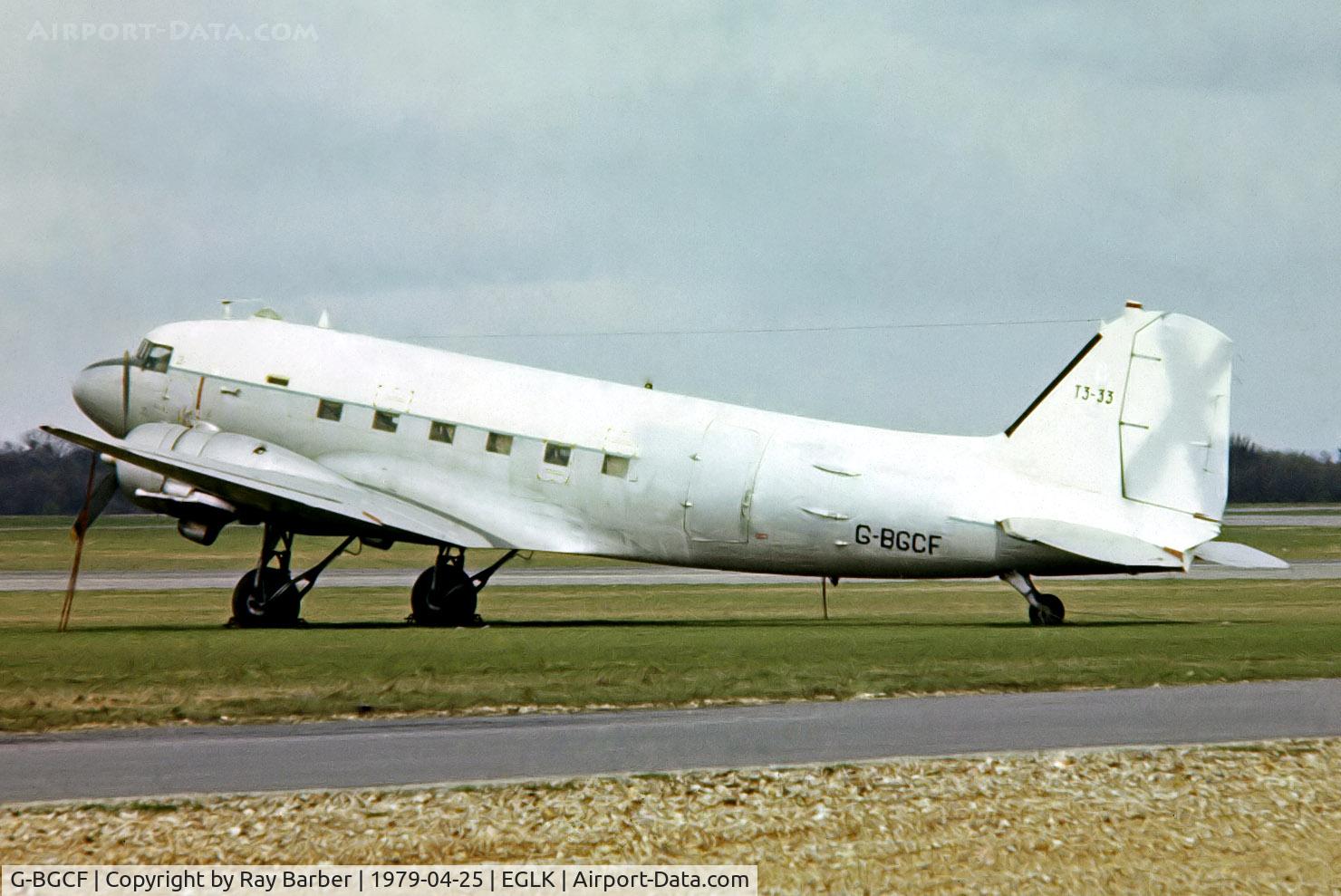 G-BGCF, 1942 Douglas C-47A-90-DL Skytrain C/N 20596, Douglas DC-3C-47A-90-DL [20596] (Fairoaks Aviation Services) Blackbushe~G 25/04/1979. From a slide.