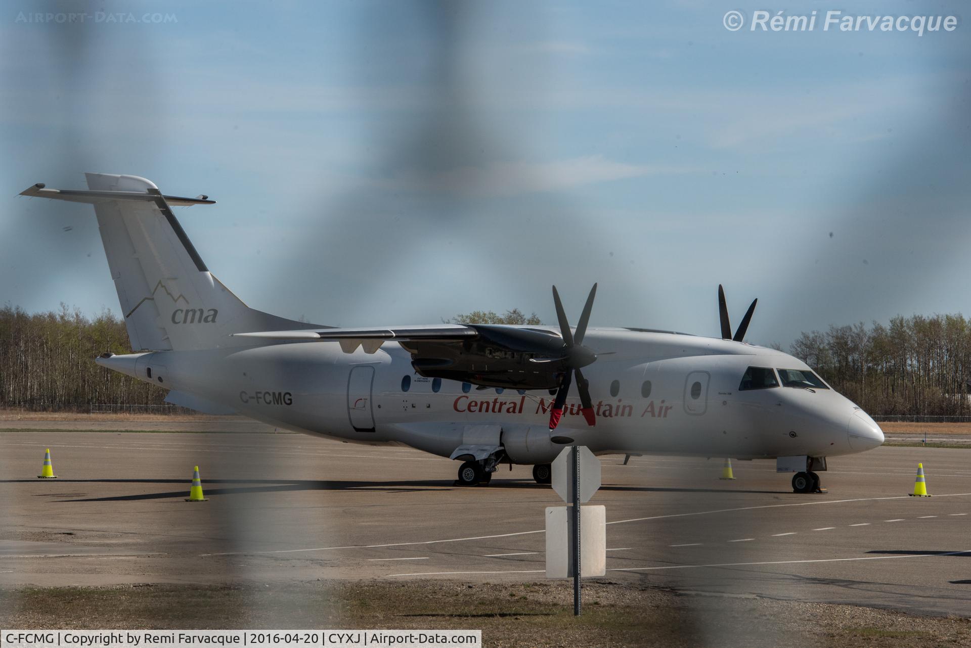 C-FCMG, 2005 Dornier 328-100 C/N 3055, Parked immediately southeast of main terminal building.
