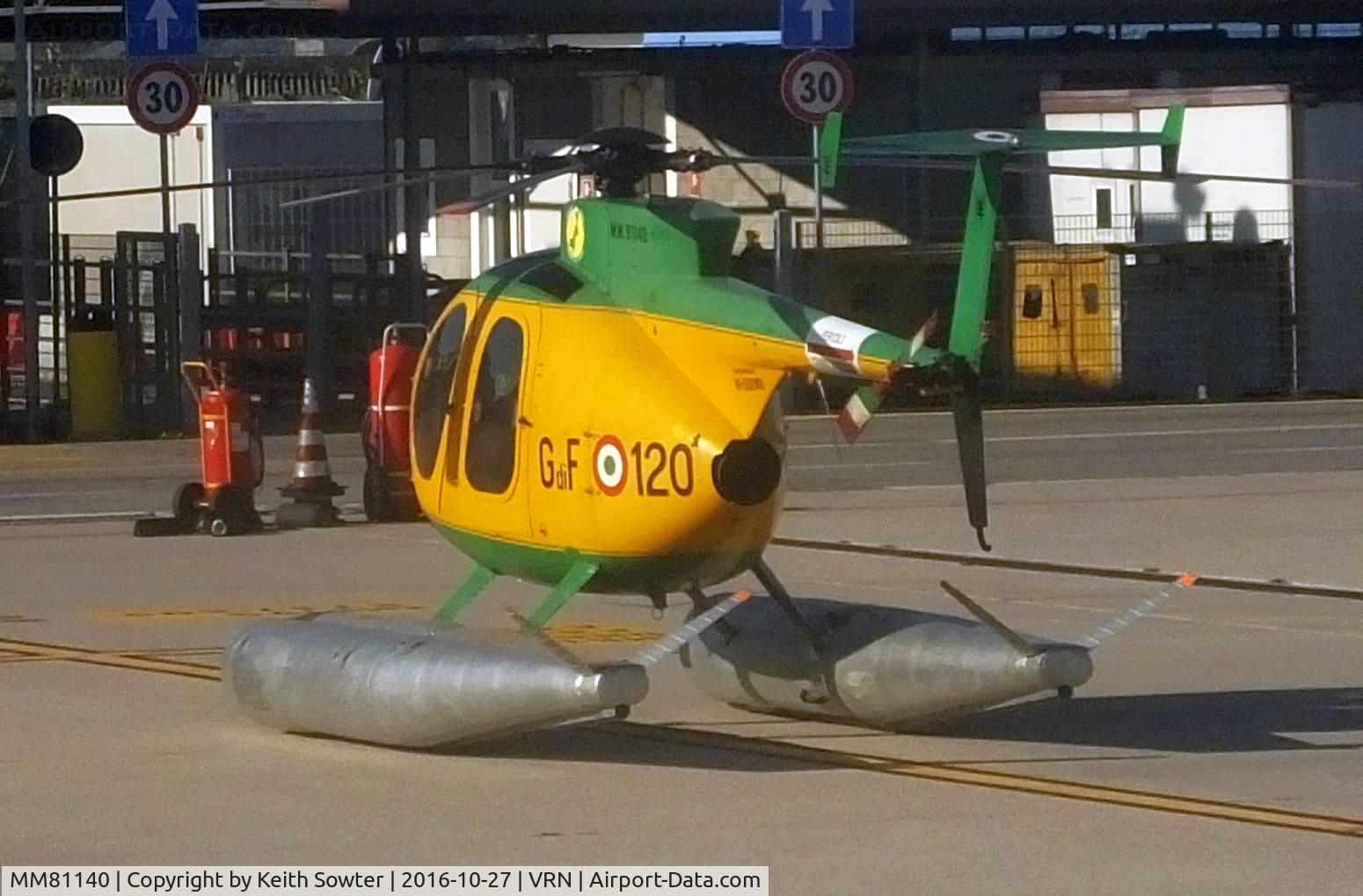 MM81140, Breda Nardi NH-500MD C/N 123, Taken through aircraft window - showing floats