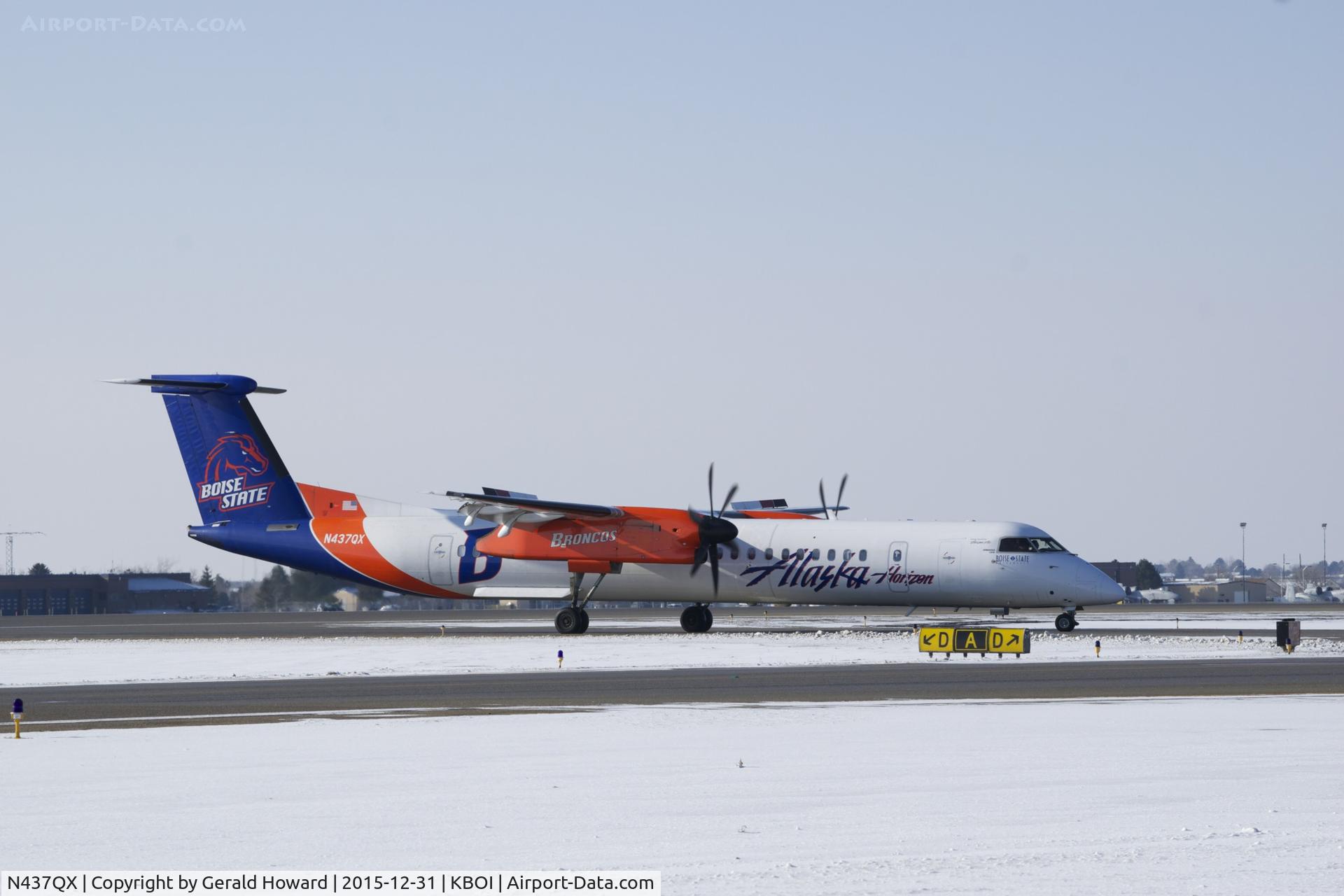 N437QX, 2009 De Havilland Canada DHC-8-402Q Dash 8 C/N 4240, Painted with Boise State Logo.