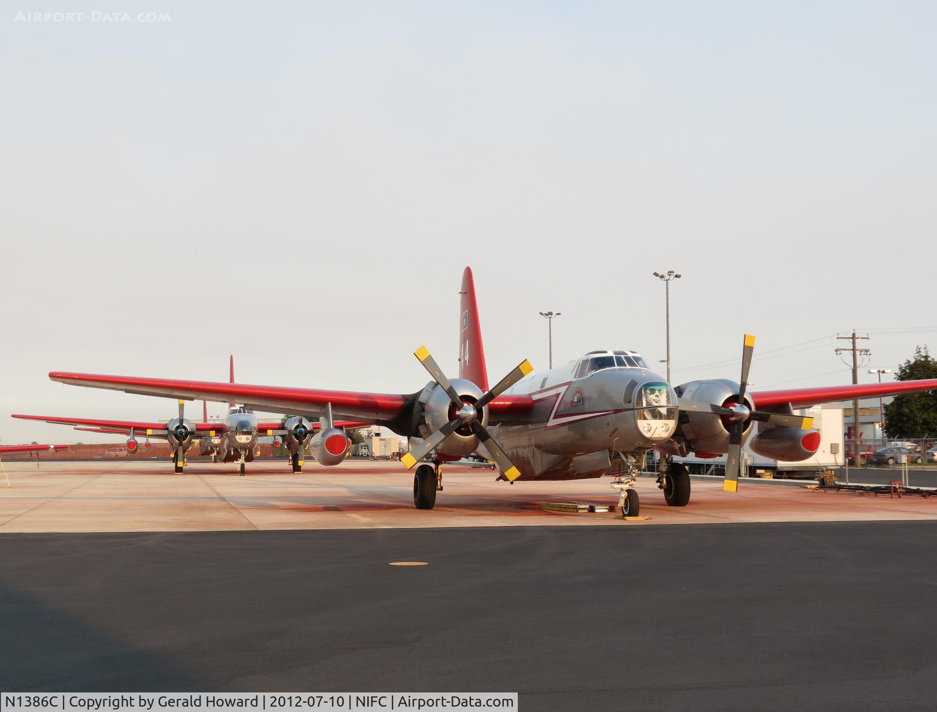 N1386C, 1954 Lockheed P2V-5 Neptune C/N 426-5268, Three Neptune's on NIFC ramp awaiting the day's flights.