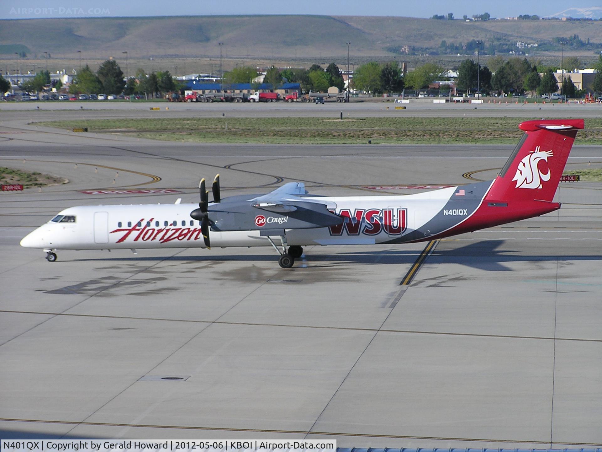 N401QX, 2001 De Havilland Canada DHC-8-402 Dash 8 C/N 4031, Push back on Horizon ramp.