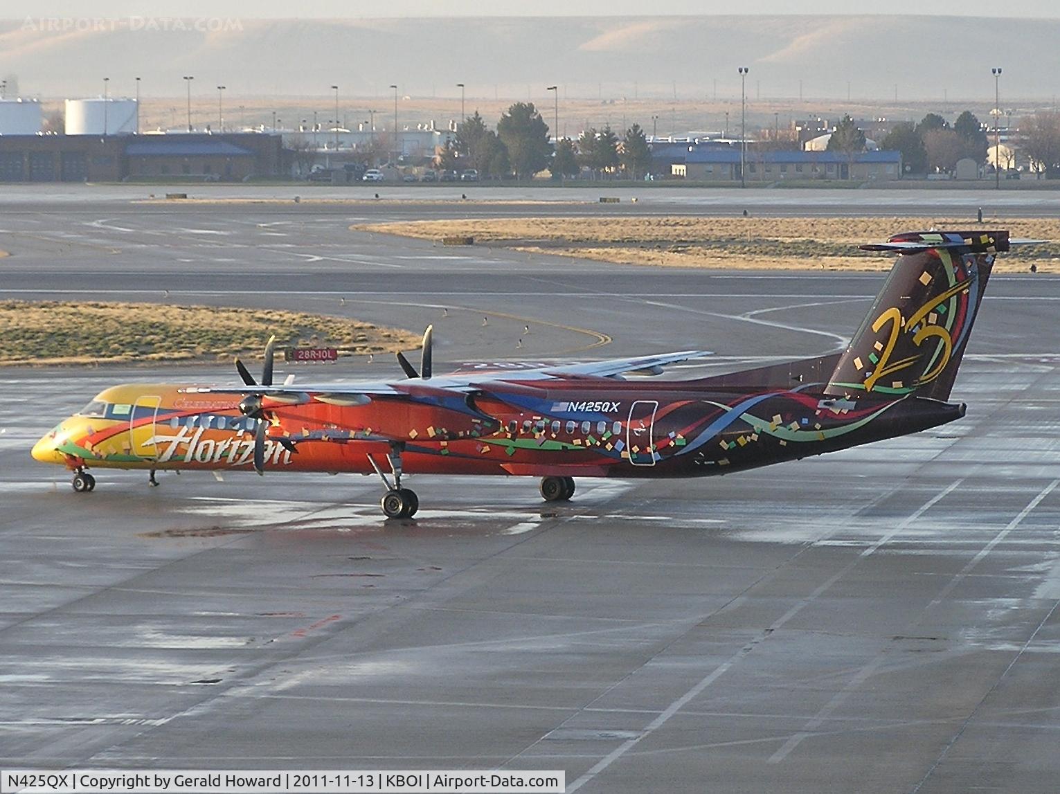 N425QX, 2001 De Havilland Canada DHC-8-402 Dash 8 C/N 4039, On Horizon ramp.