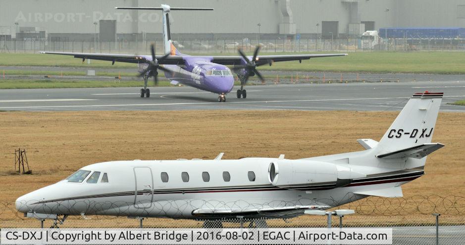 CS-DXJ, 2006 Cessna 560XL Citation Excel C/N 560-5627, Awaiting departure as flybe G-PRPC arrives (background).