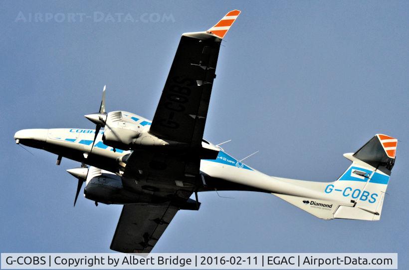 G-COBS, 2011 Diamond DA-42M-NG Twin Star C/N 42.MN020, Departing Belfast City during calibration flights.