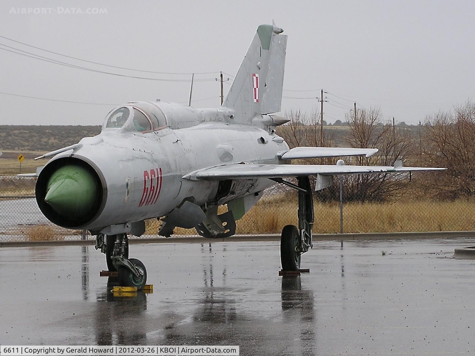6611, 2000 Mikoyan-Gurevich MiG-21PFM C/N 94A6611, Arrival day at Gowen Field Military Museum. Located on airport's SW corner.