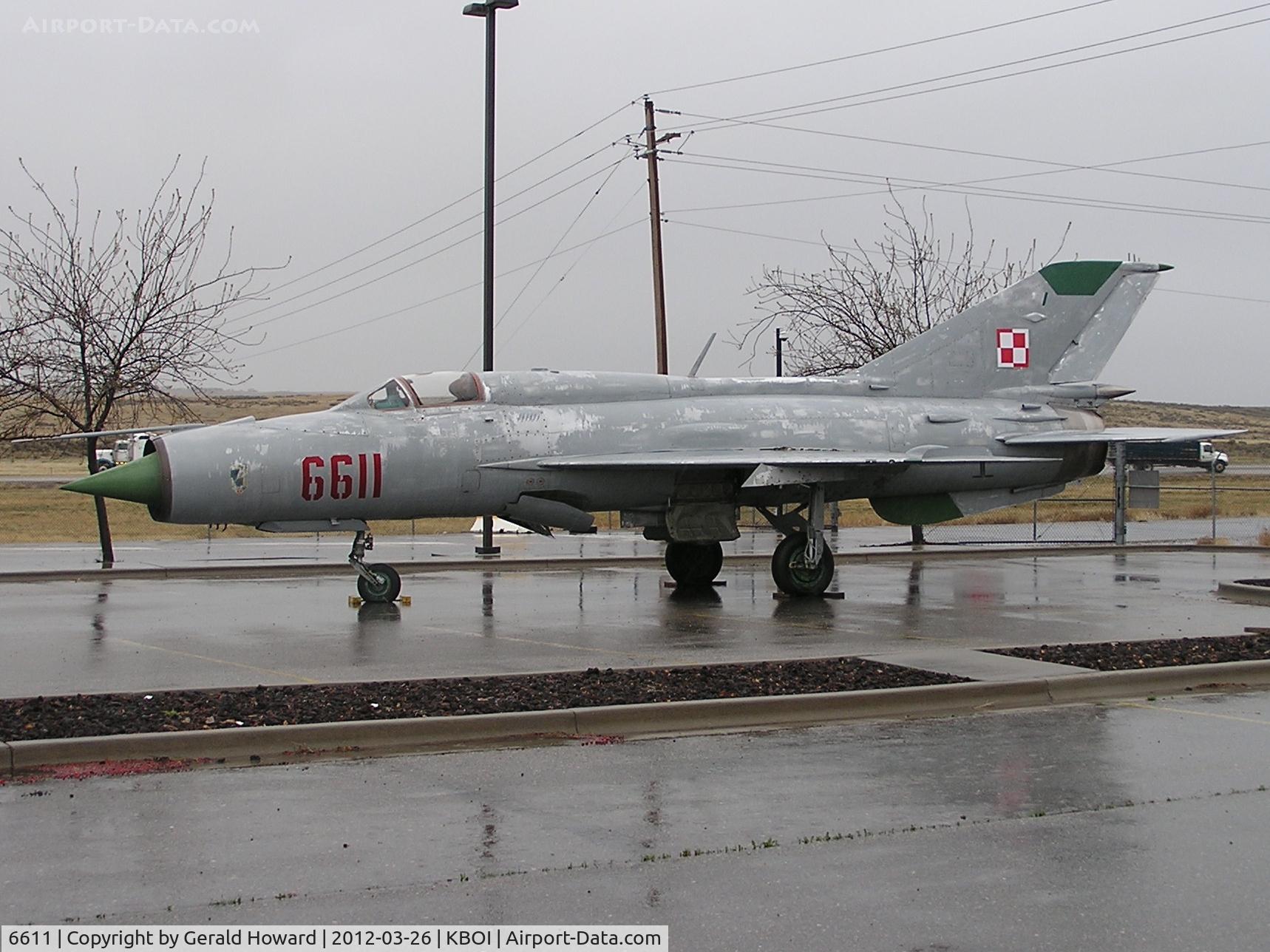 6611, 2000 Mikoyan-Gurevich MiG-21PFM C/N 94A6611, Arrival day at Gowen Field Military Museum. Located on airport's SW corner.