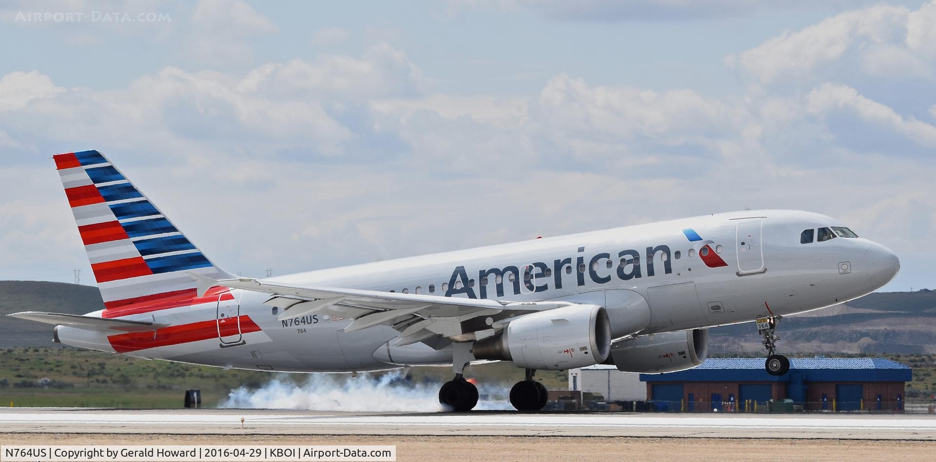 N764US, 2000 Airbus A319-112 C/N 1369, Touching down on RWY 28R.