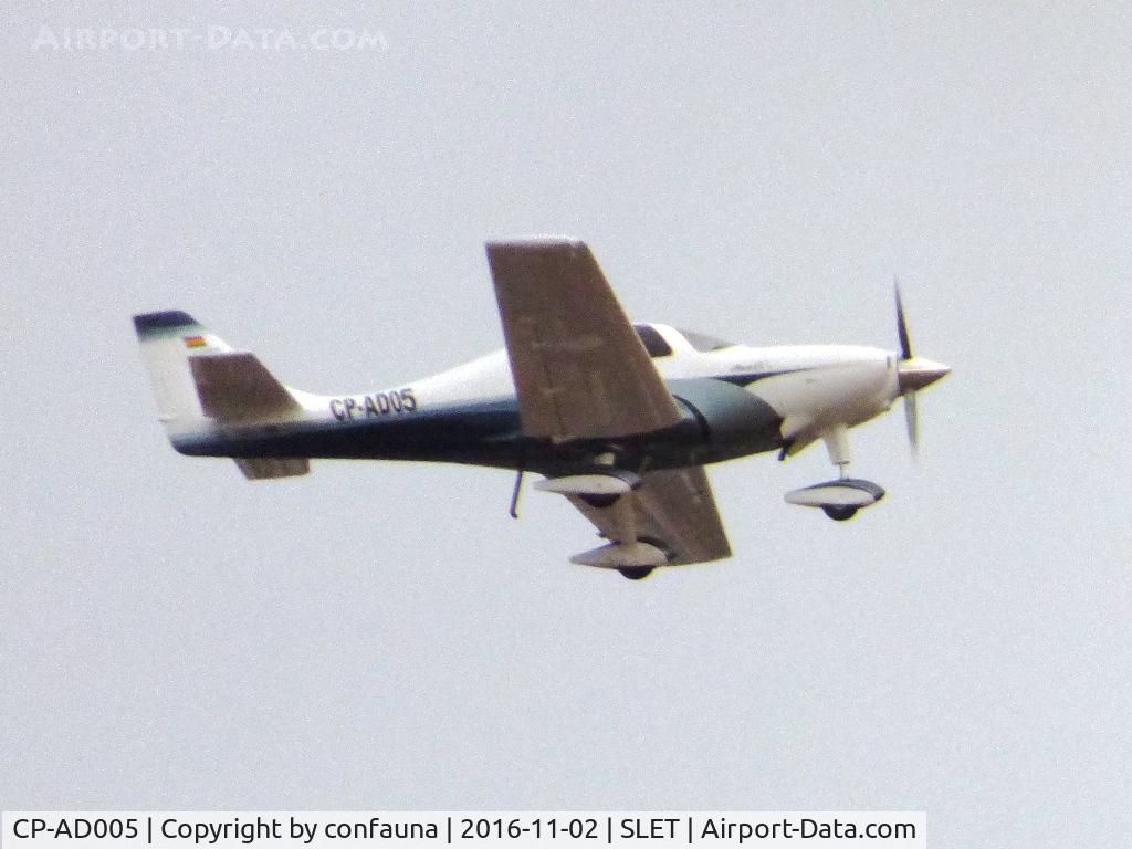 CP-AD005, 2010 Lancair Super ES C/N 096, Flying over Santa Cruz (changed registration?, but cn 96 according to DGAC)