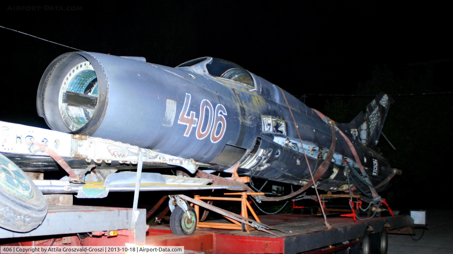 406, 1964 Mikoyan-Gurevich MiG-21PF C/N 760406, Balatonalmádi, Hungary. In road transport, in a parking lot.