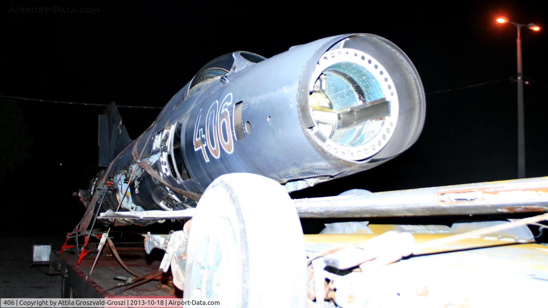 406, 1964 Mikoyan-Gurevich MiG-21PF C/N 760406, Balatonalmádi, Hungary. In road transport, in a parking lot.