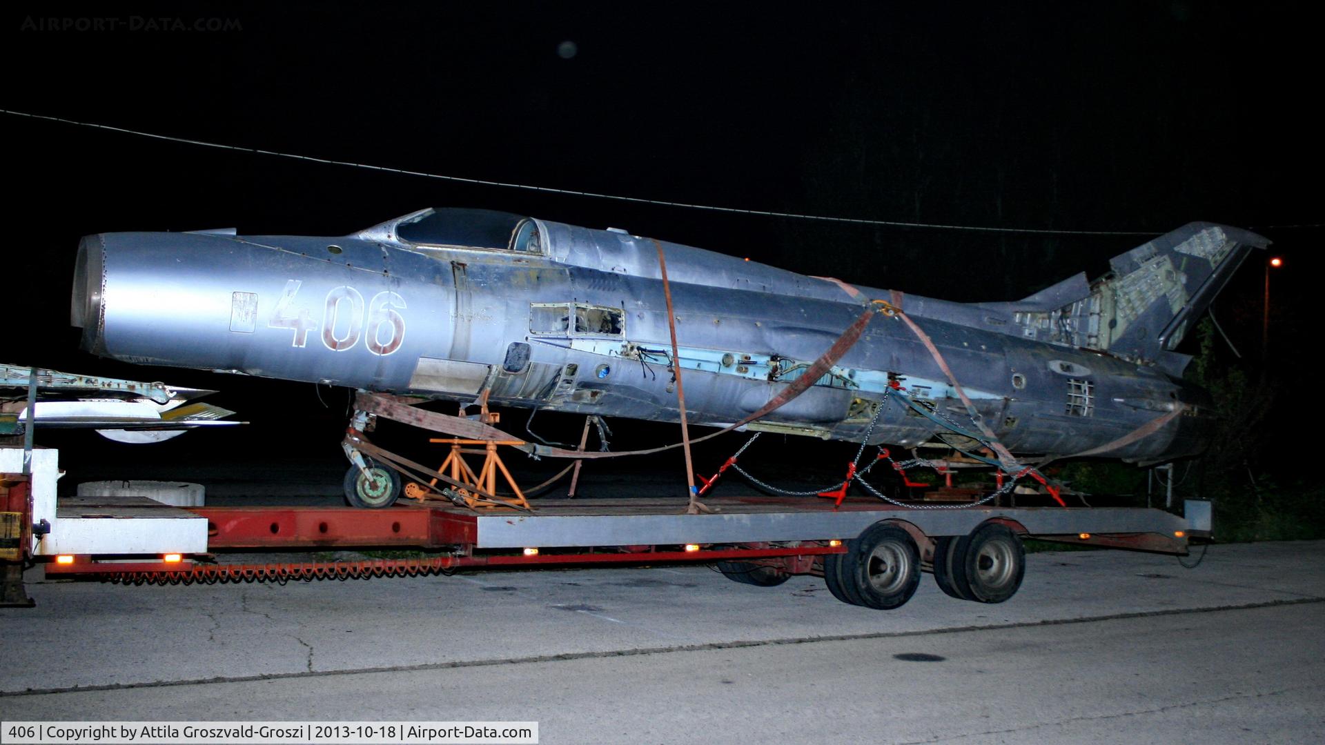 406, 1964 Mikoyan-Gurevich MiG-21PF C/N 760406, Balatonalmádi, Hungary. In road transport, in a parking lot.