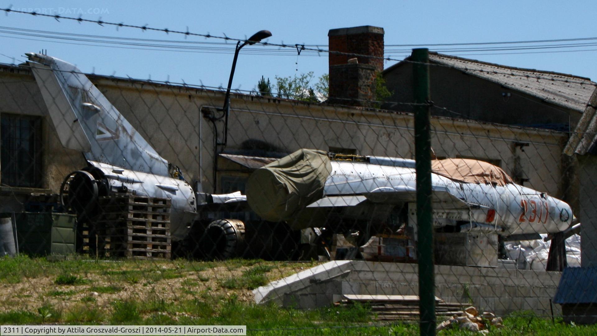 2311, 1962 Mikoyan-Gurevich MiG-21F-13 C/N 742311, Kövesgyür-puszta, Hungary. A collector's site