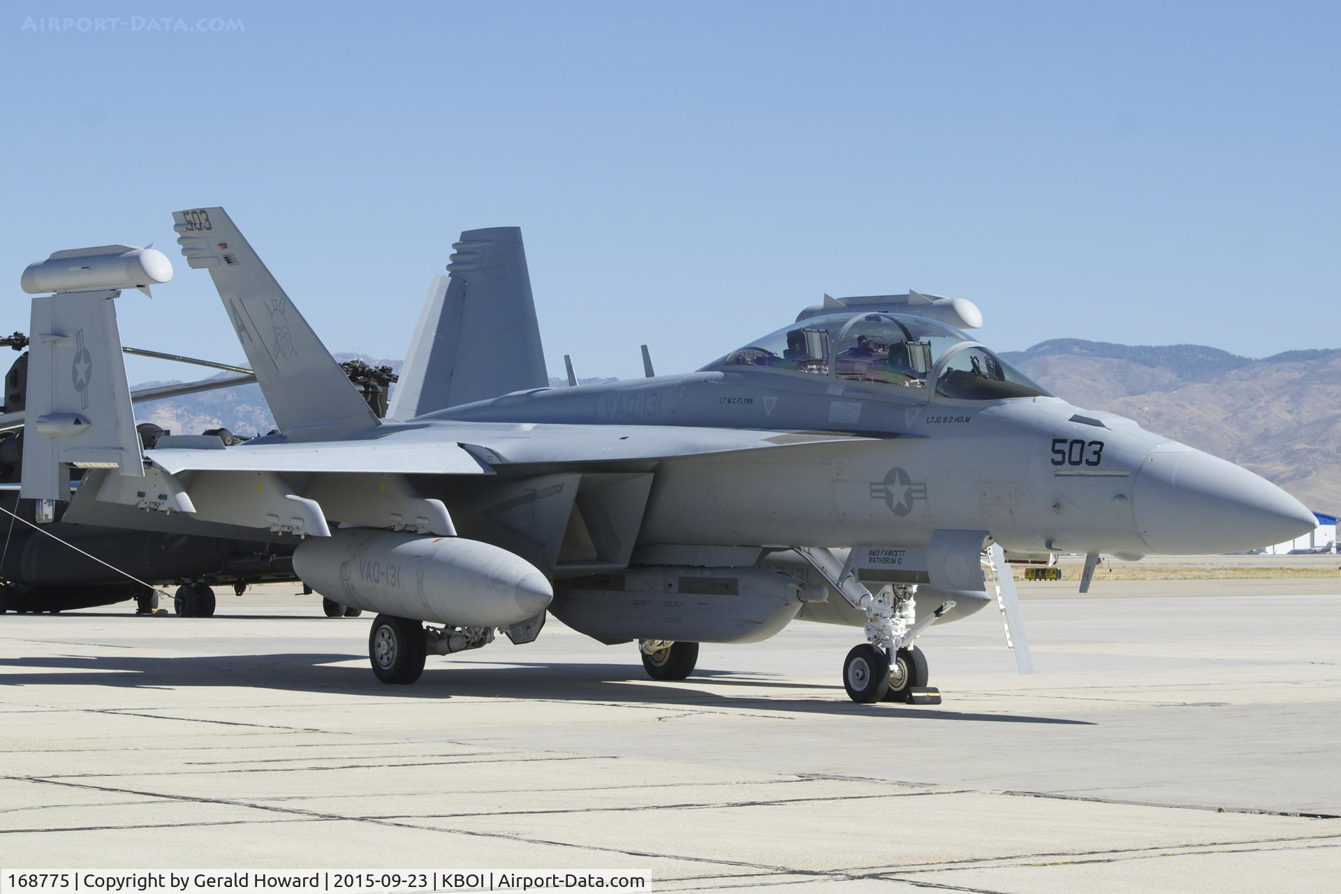 168775, Boeing EA-18G Growler C/N G-89, Parked on Western Air ramp. VAQ-131	“Lancers”,
CVN-77,USS George H.W. Bush