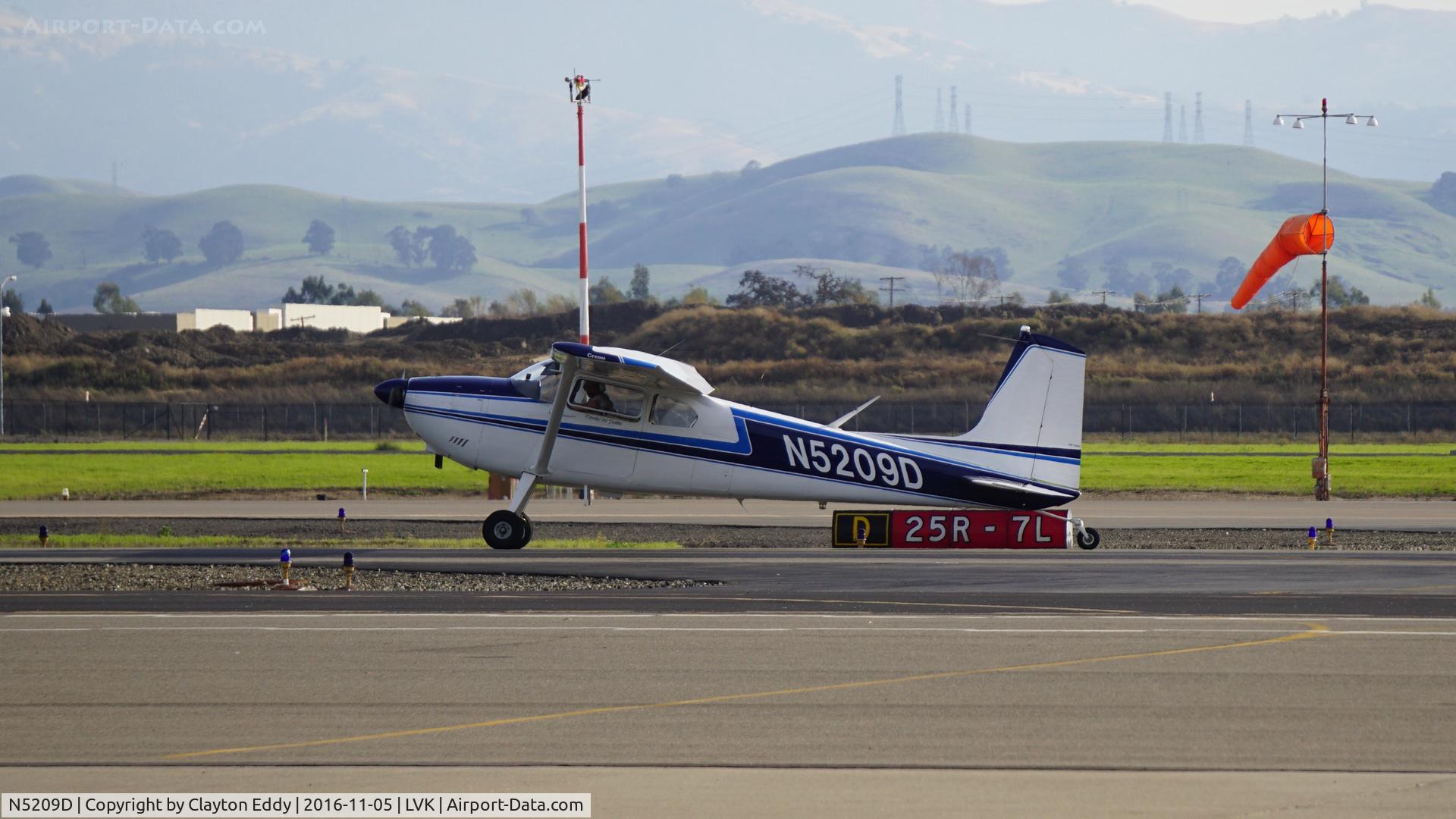 N5209D, 1957 Cessna 180A C/N 50107, Exiting the runway at Livermore Airport in California. 2016