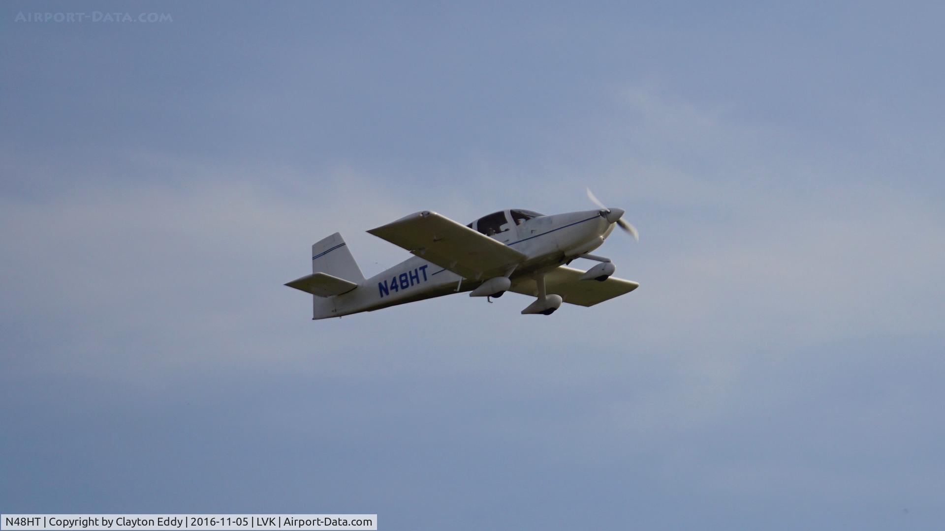 N48HT, Vans RV-10 C/N 40745, Vans departing Livermore Airport in California. 2016.