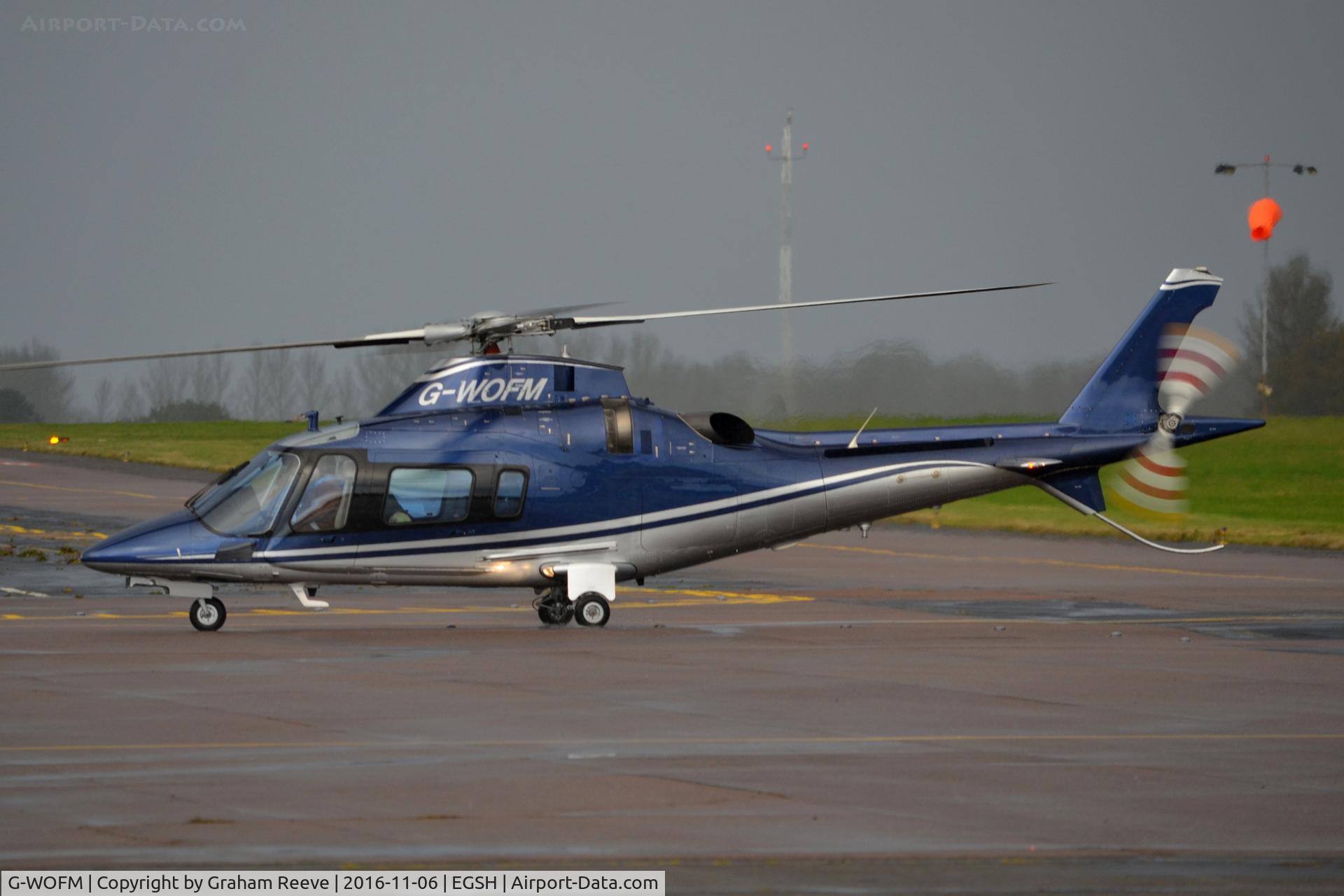 G-WOFM, 2006 Agusta A-109E Power C/N 11678, Just landed at Norwich in heavy rain.