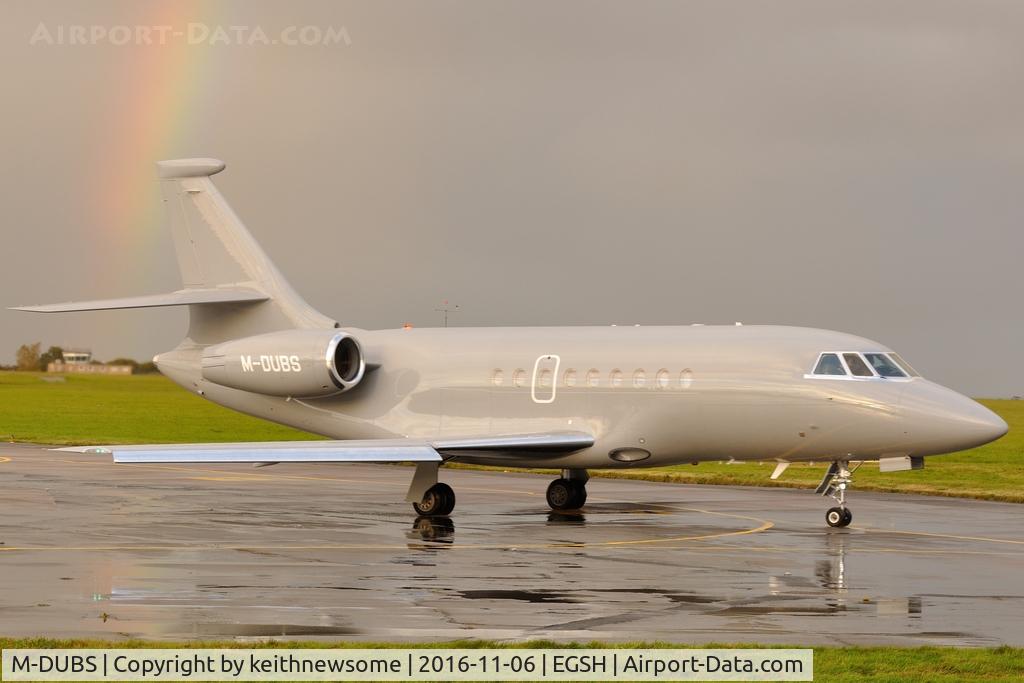 M-DUBS, 2004 Dassault Falcon 2000EX C/N 30, Leaving Norwich with a rainbow.
