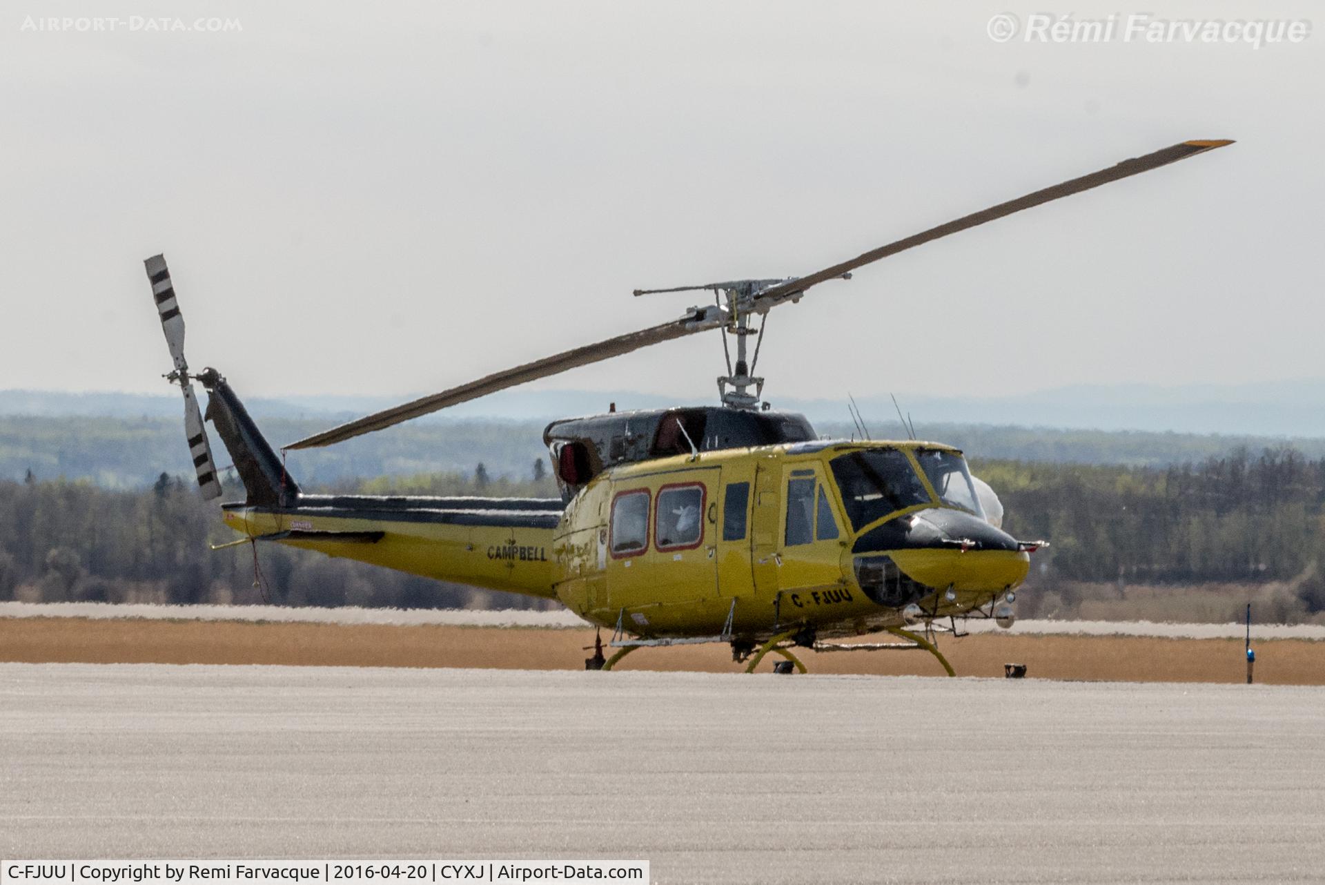 C-FJUU, 1976 Bell 212 C/N 30795, Parked opposite main terminal