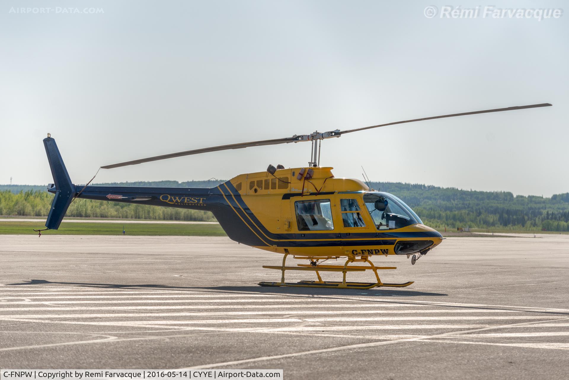C-FNPW, 1975 Bell 206B JetRanger II C/N 1690, Parked outside Qwest Helicopters hangar.