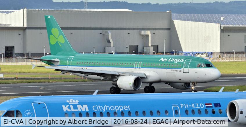 EI-CVA, 2000 Airbus A320-214 C/N 1242, Arriving from Heathrow and KLM PH-KZD awaiting departure to Amsterdam.